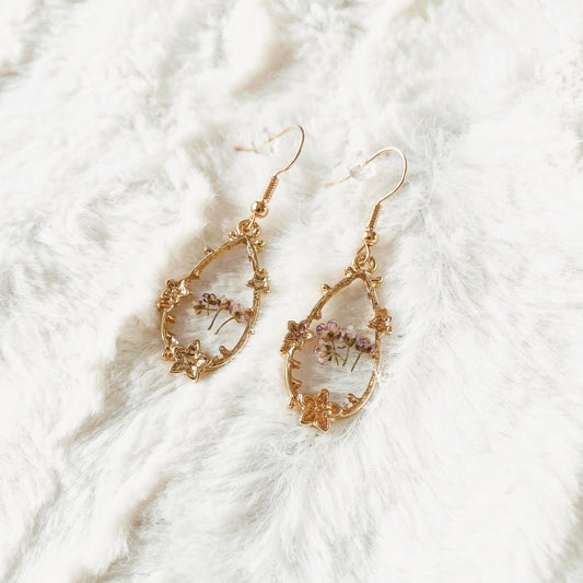 Boucles d’oreilles fleurs résine
